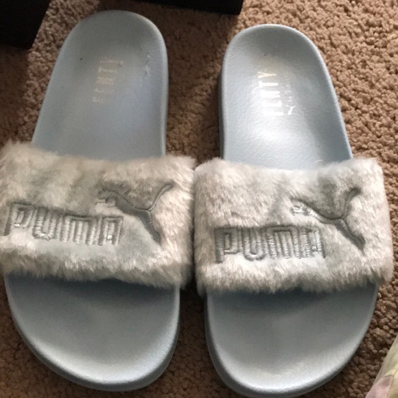 light blue puma slides